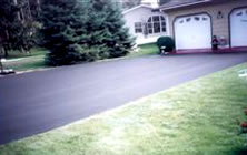 Completed asphalt driveway resealed